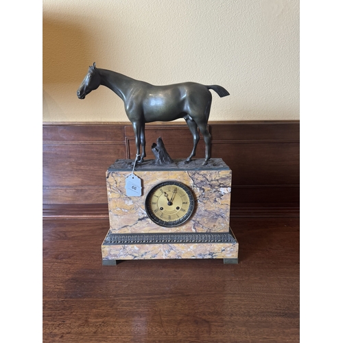 66 - 19th. C. sienna marble mantle clock with bronze mounted and surmounted with a bronze model of a hors... 