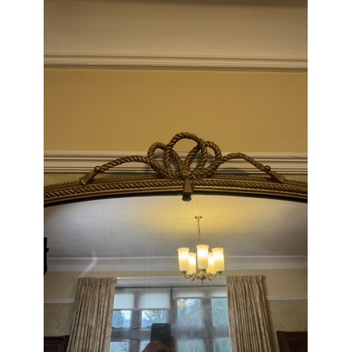 667 - Regency gilt overmantle with plain plate surmounted with rope decoration. { 112cm H X 148cm W }.