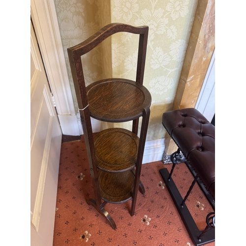 672 - Edwardian oak three tier cake stand. { 92cm H X 27cm W X 24cm D }.