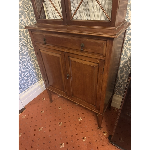 674 - Edwardian mahogany bookcase, the two astragal glazed doors over one long drawer, two raised panelled... 