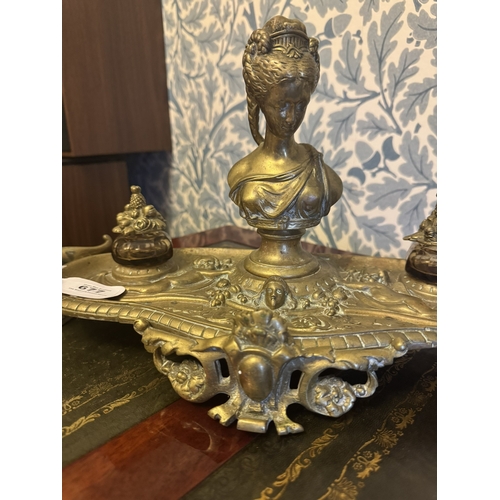 677 - 19th. C. ornamental brass desk set, surmounted with bust of a lady and two original ink bottles. {25... 