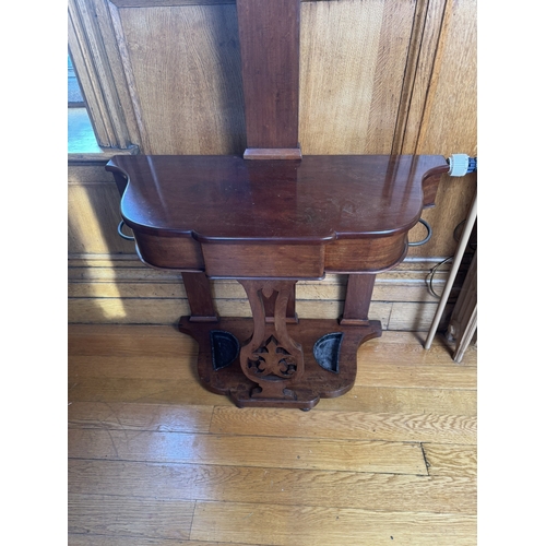 69 - 19th. C. mahogany four branch hallstand with mirror in back above a single drawer in the frieze. { 1... 