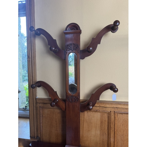 69 - 19th. C. mahogany four branch hallstand with mirror in back above a single drawer in the frieze. { 1... 