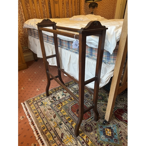 700 - Edwardian mahogany towel rail. { 80cm H X 55cm W X 27cm D }.