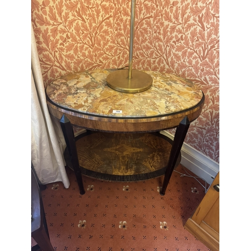 704 - Art Deco oval satinwood and ebony occasional table with marble top raised on tapered legs. {67 cm H ... 