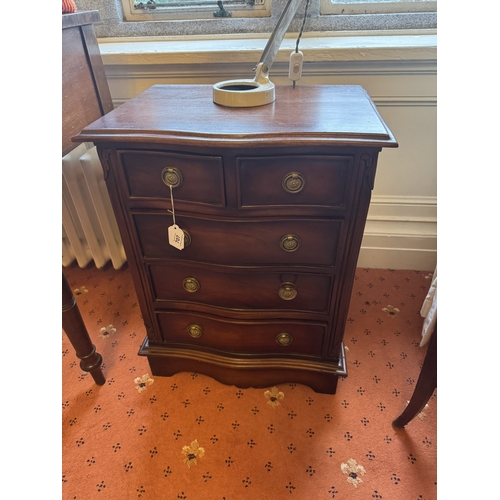 707 - Neat 20th. C. mahogany bowfronted chest, the two short drawers over three long drawers, raised with ... 