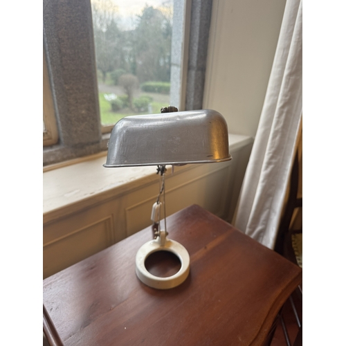 708 - Early 20th C. chrome desk lamp raised on ceramic base {40 cm H x 32 cm W x 20 cm D}.