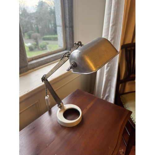 708 - Early 20th C. chrome desk lamp raised on ceramic base {40 cm H x 32 cm W x 20 cm D}.