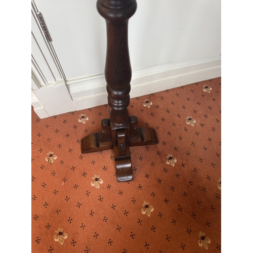 713 - 19th. C. oak torchere, raised on turned column and cross base, in the Gothic manner. { 95cm H X 36cm... 