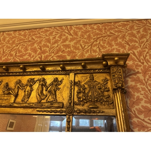 724 - Regency gilt overmantle, the inverted breakfront cornice with ball mounts above a frieze depicting d... 