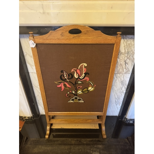 726 - 1930's oak fire screen with embroided panel. { 106cm H X 40cm W }.