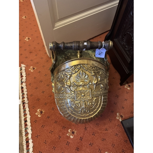 728 - 19th. C. brass coal helmet, embossed with pheonix and foliage. { 50cm H X 28cm W X 44cm D }.