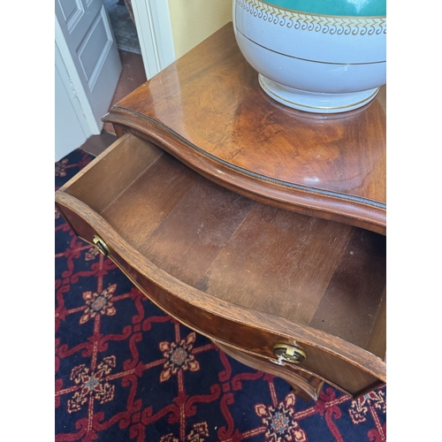 745 - Early 20th. C. serpentine fronted mahogany chest with five graduated long drawers, raised on plinth ... 