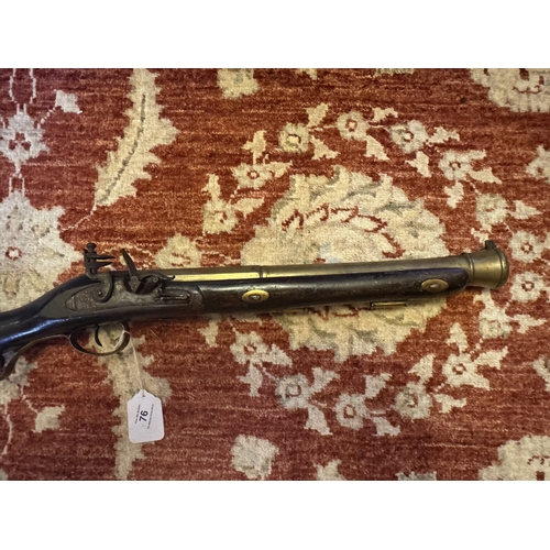 76 - 19th C brass barrelled flintlock blunderbuss stamped A - N 1443. {74 cm L x 12 cm H}.