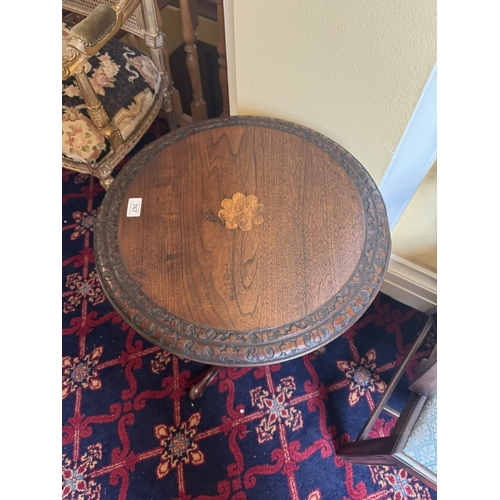 767 - 19th. C. oak wine table decorated with oak leaves, raised on turned spiral column and three outswept... 