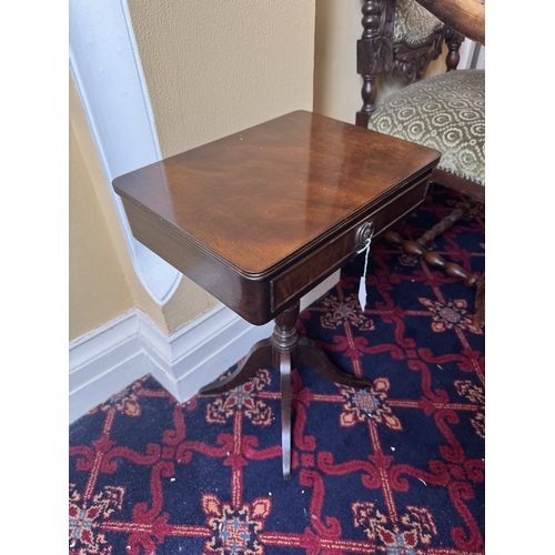 770 - Mahogany occasional table with single drawer in the frieze, raised on turned column and three outswe... 