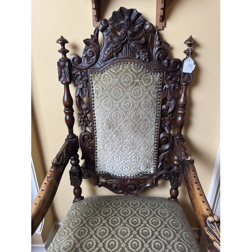 771 - 19th. C. carved upholstered walnut open armed hall chair, decorated with oak leaves, raised on shape... 