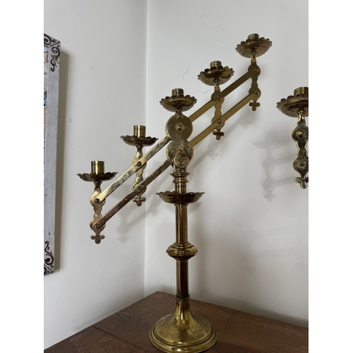 781 - Pair of 19th. C. brass Ecclesiastical candlesticks. { 55cm H X 321cm Dia }.