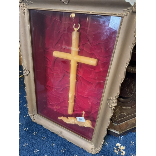 807 - Crucifix resting on red velvet, mounted in a glazed case.  { 59cm H X 42cm W X 10cm D }.