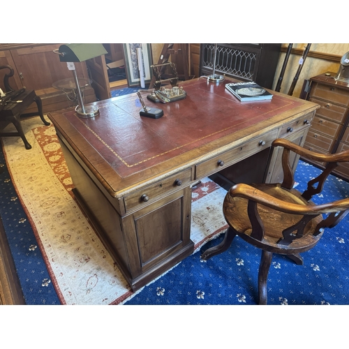 81 - 19th. C. mahogany partner's desk with tooled leather inset, with centre short drawer flanked by two ... 