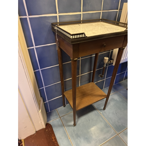 816 - French  mahogany bedside table, the gallery back above  the marble top above a single drawer in the ... 