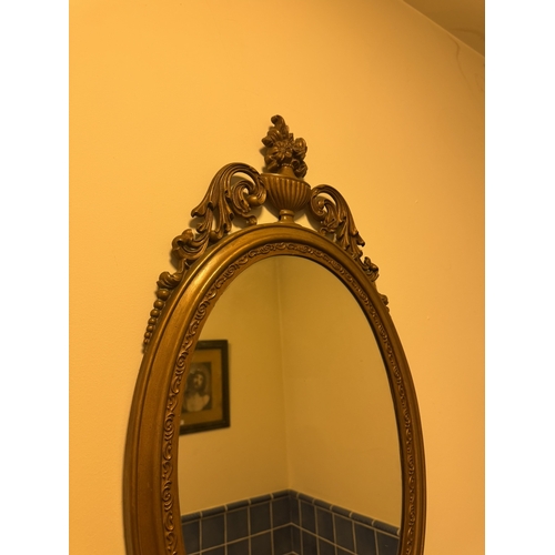 819 - 19th. C. gilt wall mirror surmounted with an urn and foliage. { 77cm H X 40cm W }.