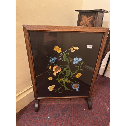 823 - 1930's oak firescreen inset with coloured print of flowers. { 74cm H X 53cm W }.