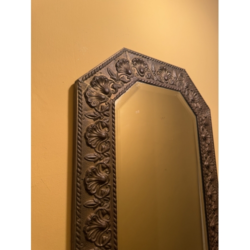 825 - Pair of brass wall mirrors with bevelled platesand decoarted with foliage. { 73cm H X 43cm W }.