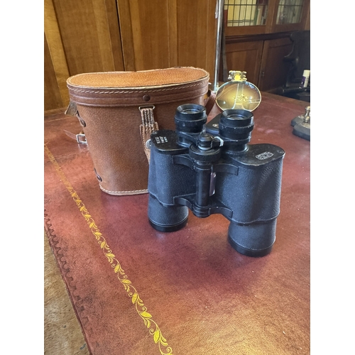 84 - Pair of Lumier binoculars in origal leather case. { 18cm H X 9cm W X 9cm D }.