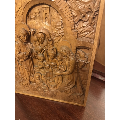 843 - Emil Kloffel Carved oak plaque depicting The Nativity . { 40cm H X 31cm W }.