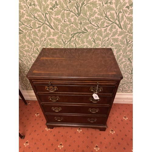 859 - Early 20th. C. mahogany chest, the brushing slide above four graduated long drawers, raised on brack... 