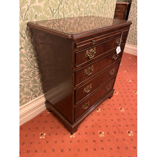 859 - Early 20th. C. mahogany chest, the brushing slide above four graduated long drawers, raised on brack... 