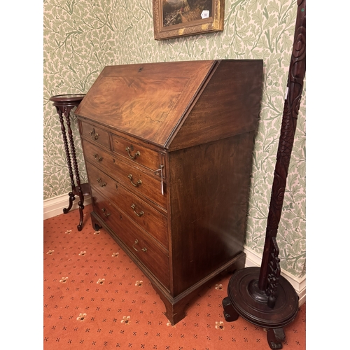 869 - Georgian inlaid mahogany fall front writing desk, the fall front enclosing a fitted interior above t... 