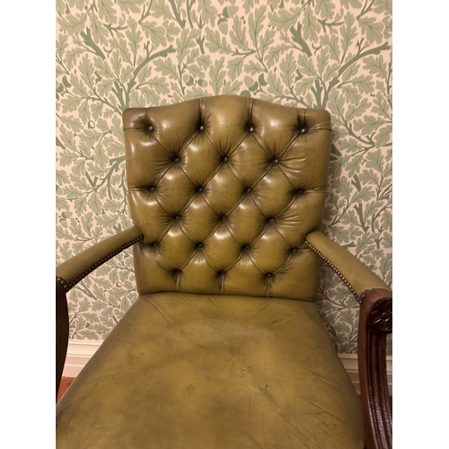 870 - Upholstered button backed mahogany open armed chair in the Chippendale manner. { 101cm H X 65cm W X ... 