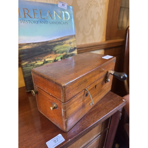 94 - Early 20th C. electric shock machine in mahogany case {14 cm H x 27 cm W x 19 cm D}.