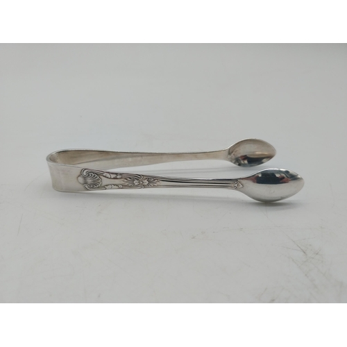 1012 - English silver sugar tongs. Hallmarked in Sheffield. 1903 - 04. Maker: Joseph Rodgers & Sons { subse... 