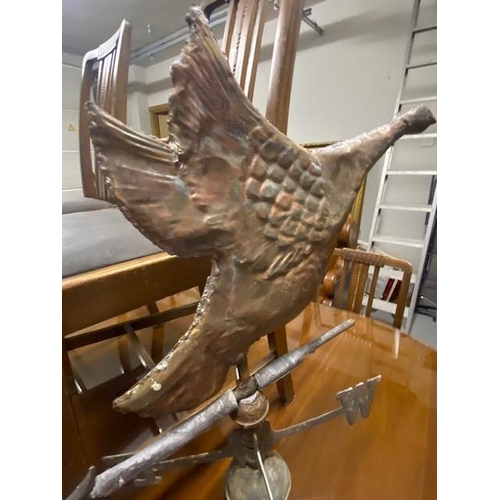 1114 - Early 19th. C. copper and brass weather vane in the form of  a Goose in Flight. { 70cm H X 76cm W }.