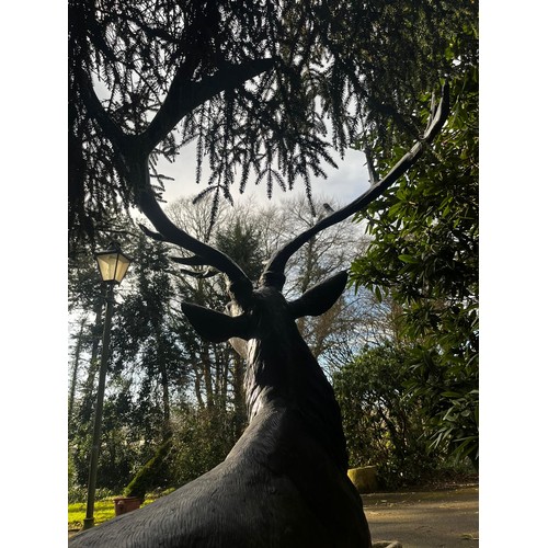 45A - Good quality majestic bronze stag on craggy rock {224cm H x 150cm W x 107cm D}