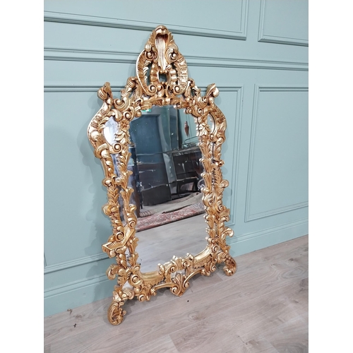 580a - Ornate French gilt wall mirror, surmounted with a large shell, in the Victorian manner. { 133cm H X ... 