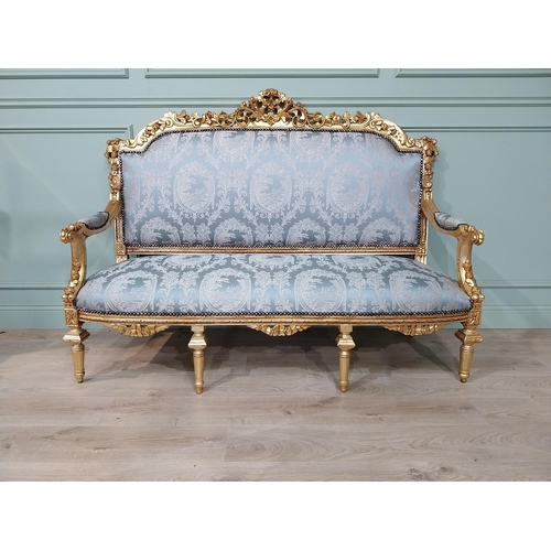 698 - Ornate French giltwood upholstered sofa, raised on turned tapered legs. { 125cm H X 164cm W X 67cm D... 