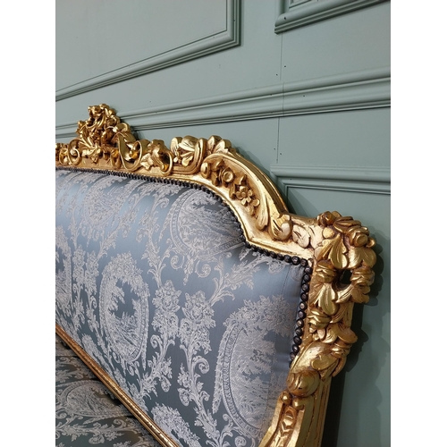 698 - Ornate French giltwood upholstered sofa, raised on turned tapered legs. { 125cm H X 164cm W X 67cm D... 