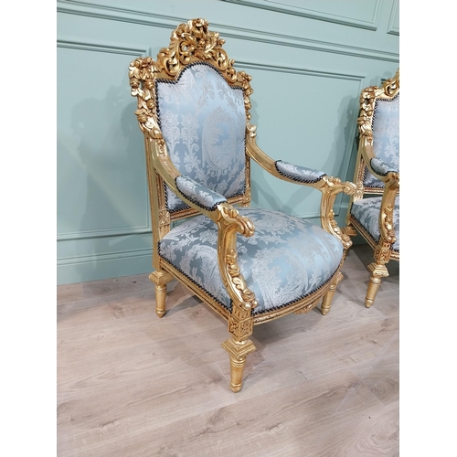 698A - Pair of ornate French giltwood upholstered open armchairs., raised on turned tapered legs. { 119cm H... 