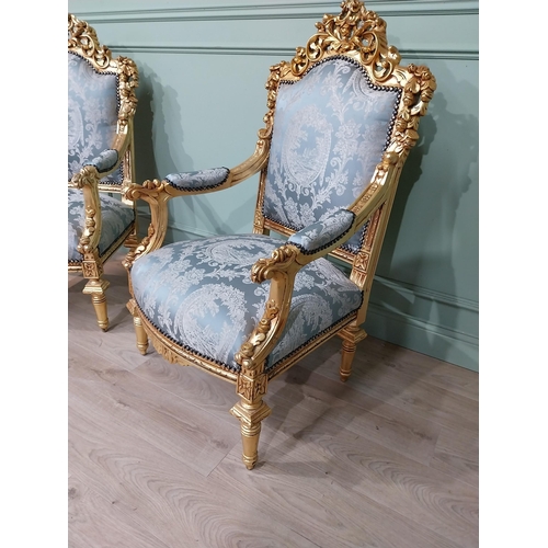 698A - Pair of ornate French giltwood upholstered open armchairs., raised on turned tapered legs. { 119cm H... 