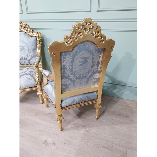 698A - Pair of ornate French giltwood upholstered open armchairs., raised on turned tapered legs. { 119cm H... 