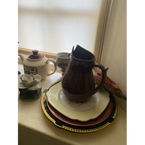 431 - Miscellaneous lot on window sill  -  glassware, tea pots, candlesticks, plates, travel jug etc.