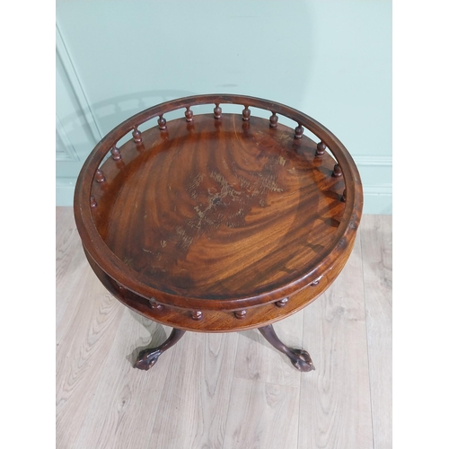 70A - Mahogany ship's table  with gallery top on single turned column on tripod base with claw and ball fe... 