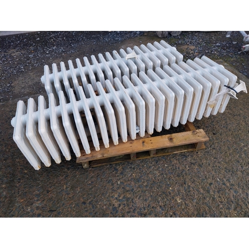 465 - Two cast iron radiators in the Victorian style {One - 31cm H x 105cm W x 34cm D Other - 31cm H x 136... 