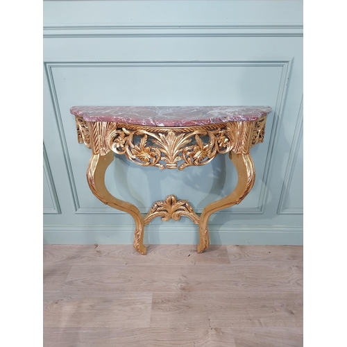 720A - French gilt console table with marble top in the Victorian style.