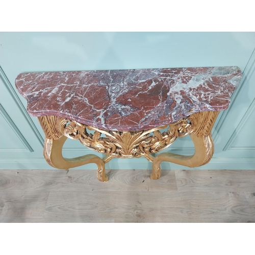 720A - French gilt console table with marble top in the Victorian style.