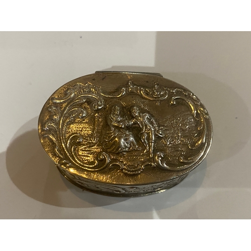 997A - English silver pill box, decorated with a lady and gentleman.  Hallmarks rubbed. { 2.5cm H X 5.5cm W... 